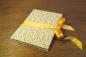 Preview: Yellow mini photo album with small flowers, yellow bow